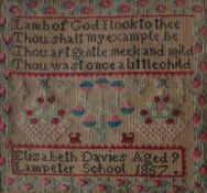 A mid 19th century woolwork sampler, wit