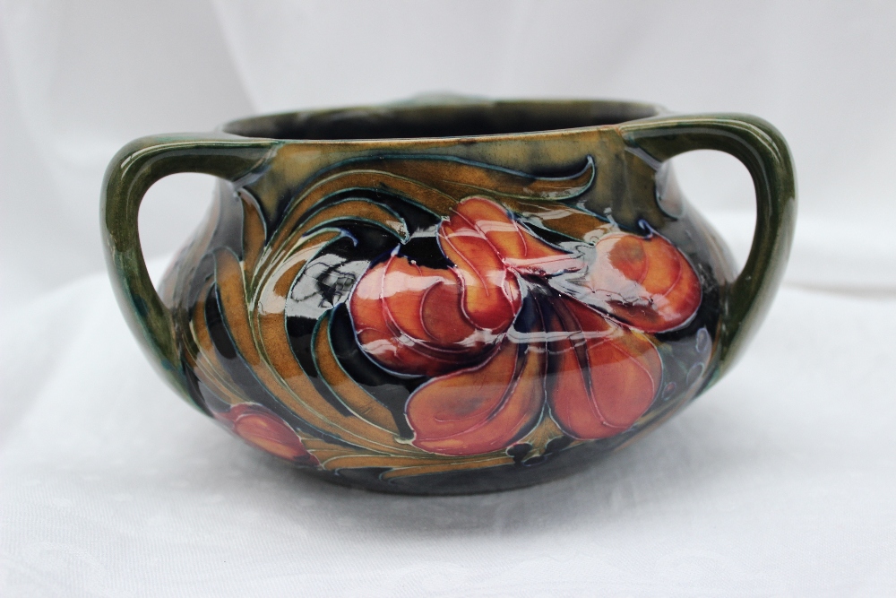 A Moorcroft Spanish pattern three handled vase of squat circular form, signature to the base and - Image 3 of 6