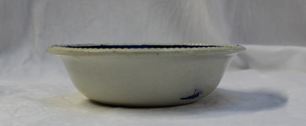 A 19th century spongeware bowl decorated with flowerheads and leaves to a blue swag drop border, - Image 3 of 4