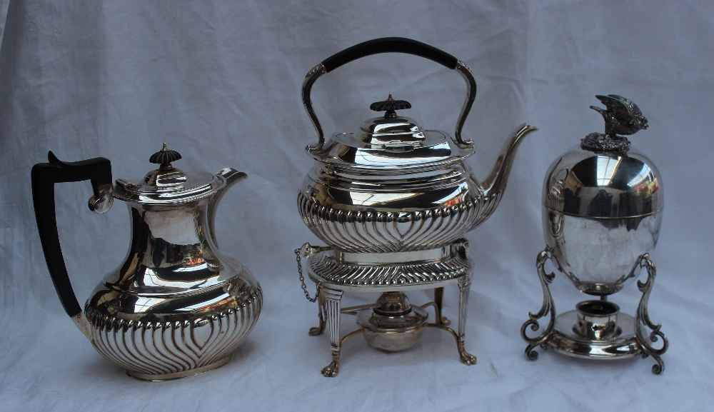 An Elizabeth II silver kettle on stand,