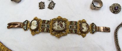 A cameo bracelet, set with three cameos