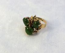 A Jade and yellow metal dress ring set w