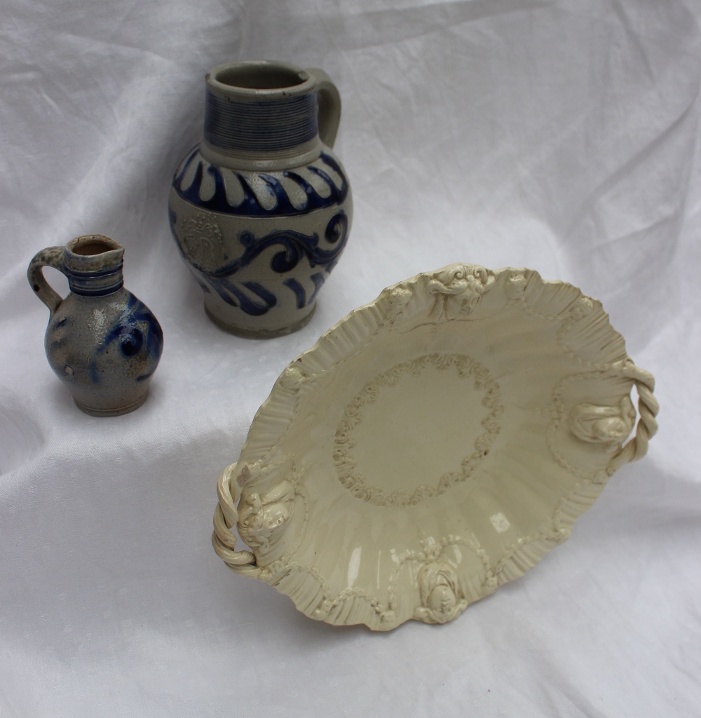 A 19th century creamware twin handled di