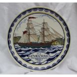 A Poole pottery charger painted with a s