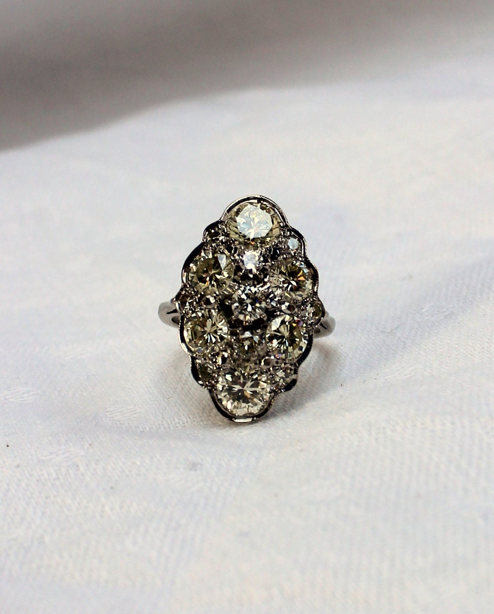 A diamond cluster ring, set with fifteen brilliant cut diamonds totalling approximately 4cts, to a - Image 5 of 6