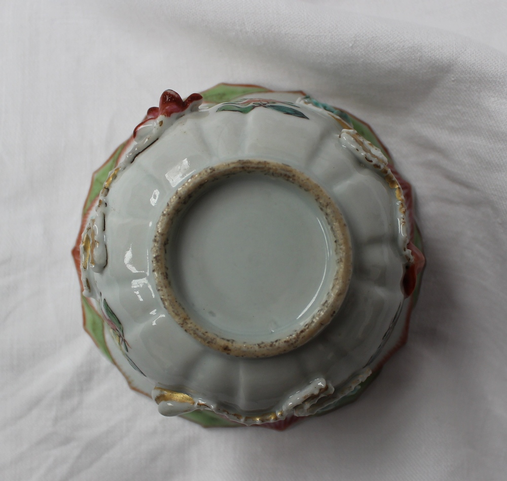 A 19th century Chinese porcelain bowl with a scalloped edge with ogee panels, sprays of garden - Image 6 of 6