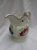 A 19th century pottery jug painted with