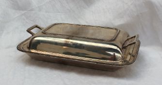 A George VI silver entree dish and cover  of rectangular form with gadrooned edge and rectangular