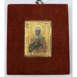 An 18th century Macedonian icon depicting a saint against a gilt background, 6 x 4.5cm CONDITION
