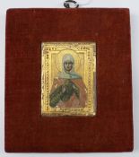 An 18th century Macedonian icon depicting a saint against a gilt background, 6 x 4.5cm CONDITION