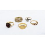 An 18ct yellow gold ring together with five other 18ct yellow gold rings,