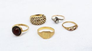 An 18ct yellow gold ring together with five other 18ct yellow gold rings,