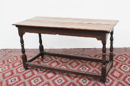 A late 18th century /early 19th century oak refectory table,