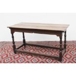 A late 18th century /early 19th century oak refectory table,