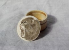 A 19th century Chinese ivory pill box of circular form,