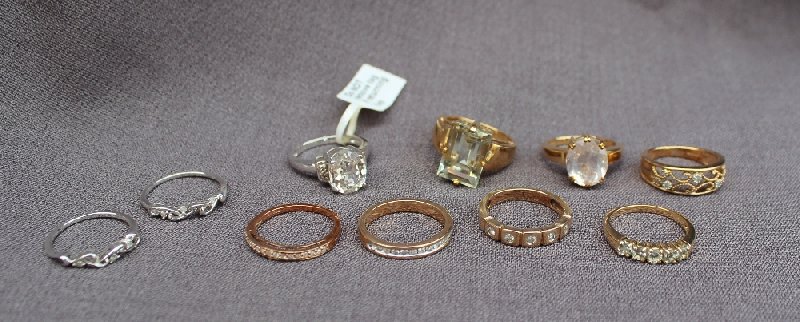 A 9ct yellow gold ring set with aquamarines together with a diamond set ring and other 9ct gold - Image 2 of 3