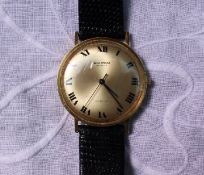 A gentleman's 18ct yellow gold Waltham Incabloc wristwatch with a gilt metal dial and Arabic