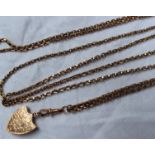 A 9ct yellow gold long chain with an engraved shield shaped locket,