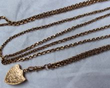 A 9ct yellow gold long chain with an engraved shield shaped locket,