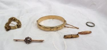 A 9ct yellow gold hinged bangle, together with a yellow metal "Baby" bar brooch marked 9ct,