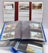 Three postcard albums containing circa 100 Breconshire scenes and circa 300 South and West Wales