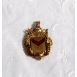 A 9ct yellow gold pendant bearing the enamel Coat of arms of the County Borough of Newport,