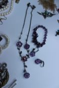 A large collection of costume jewellery including pendants, necklaces, rings, etc