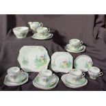 A Shelley part tea set comprising six cups, six saucers, sugar bowl, cream jug, six side plates