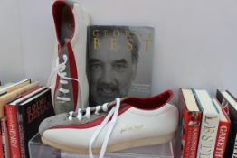 A pair of Ben Sherman "George Best" trainers together with a collection of sporting biographies and