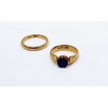 A 22ct yellow gold sapphire set signet ring, together with a 22ct yellow gold wedding band,