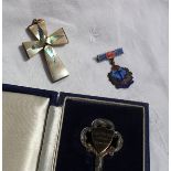 A mother of pearl cross together with a Royal Navy badge and a cased silver key