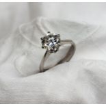 A solitaire diamond ring the brilliant cut diamond approximately 1.5 carats, to an 18ct white gold