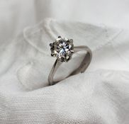 A solitaire diamond ring the brilliant cut diamond approximately 1.5 carats, to an 18ct white gold