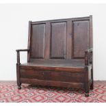 An 18th century style oak bench,