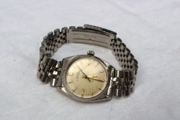 A Gentleman's Rolex oyster perpetual wristwatch, the silvered dial with gilt batons, gilt metal