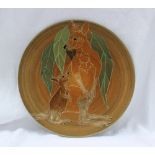 A Dennis China Works pottery trial plate decorated in the Kangaroo pattern, impressed marks