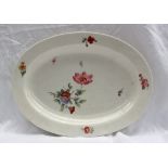 A Swansea porcelain dish of oval form painted with sprays of garden flowers, impressed mark and