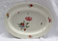 A Swansea porcelain dish of oval form painted with sprays of garden flowers, impressed mark and