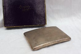A George V silver cigarette case of rectangular form with engine turned decoration, Chester, 1930,