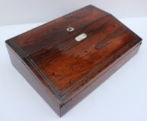 A Victorian rosewood laptop desk, with a hinged sloping fall inset with mother of pearl,
