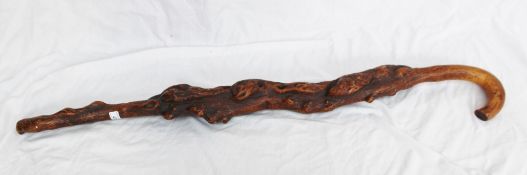 A contorted treen walking stick,