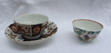 An 18th century Worcester tea bowl and saucer decorated in the radiating Imari palette, seal mark to
