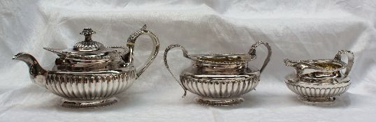 A George IV silver matched three piece tea set,