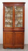 A 19th century oak and mahogany standing corner cupboard,