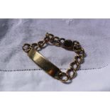 A 9ct yellow gold identity bracelet with open links,