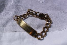 A 9ct yellow gold identity bracelet with open links,