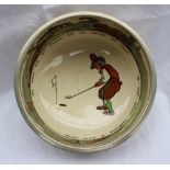 A Royal Doulton pottery fruit bowl, with an electroplated rim decorated with a golfer inscribed "All