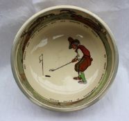 A Royal Doulton pottery fruit bowl, with an electroplated rim decorated with a golfer inscribed "All