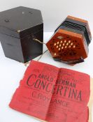 A Lachenal & Co concertina with pierced wooden ends, No.