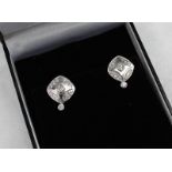 A pair of 18ct white gold earrings,